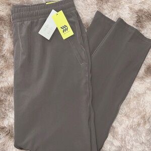 NWT All in Motion, Mens Woven Athletic Pants, Brown, Tapered, Zipper Pockets UPF